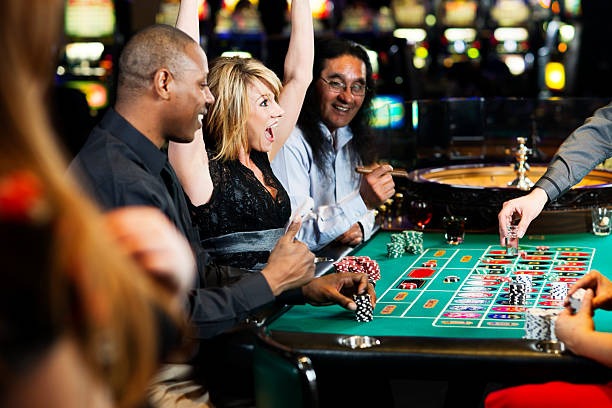 Wild Coaster game interface showing five reels and betting controls on a mobile screen
